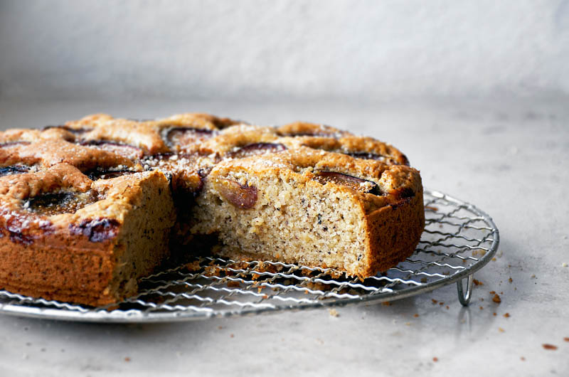 Fig cake with slice removed to show interior texture.