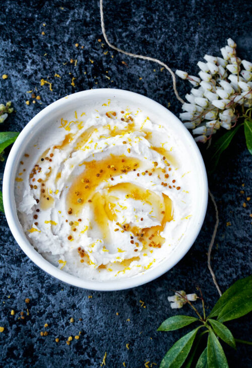 Top down view of thickened yogurt in a dish.