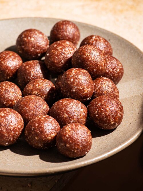 Energy bites on a large serving plate.