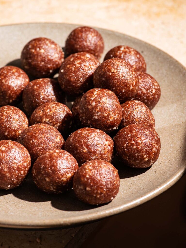Energy bites on a large serving plate.