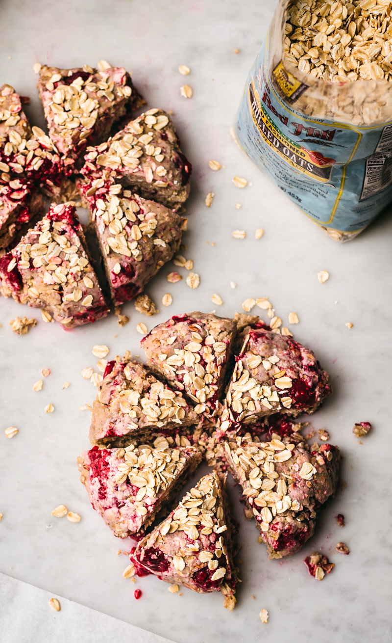 Raspberry oatmeal scones, rounds cut into triangles, unbaked.