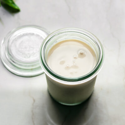 Oat cream in small glass jar.