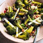 Front/top view of broccoli salad, with roasted florets and julienned stems.