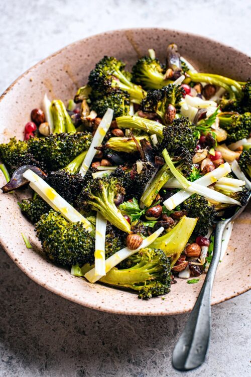 Front/top view of broccoli salad, with roasted florets and julienned stems.