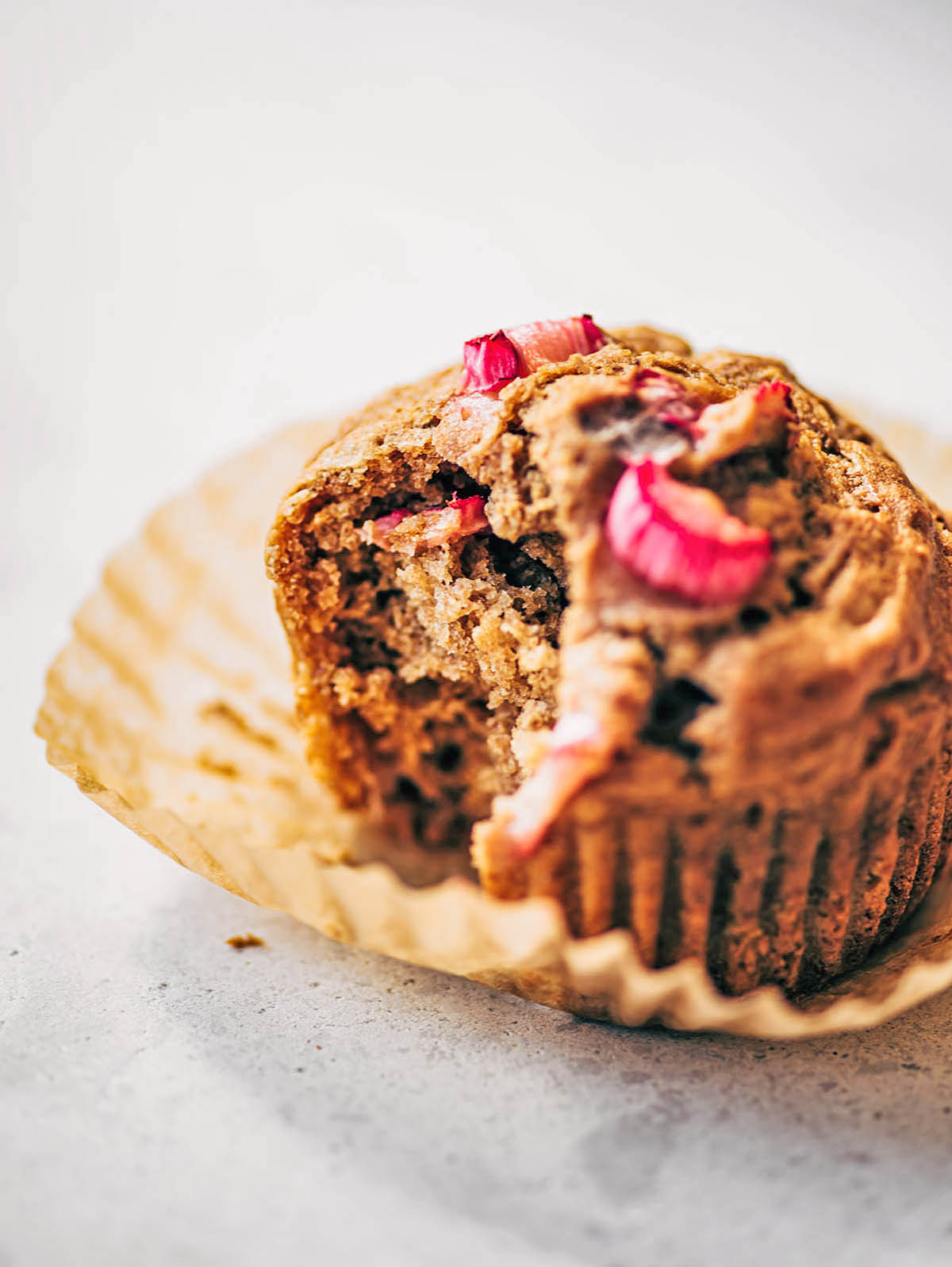 Muffin with a bite taken out showing interior.