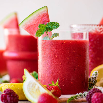 Close up of a pink smoothie in a glass.