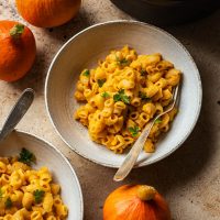 Butternut squash mac and cheese in a bowl.