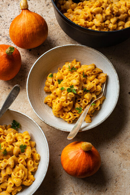 Butternut squash mac and cheese in a bowl.