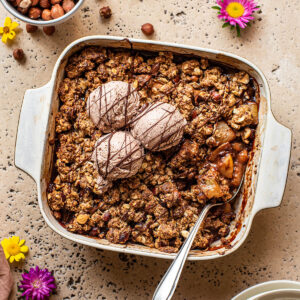 Chocolate pear crisp with three scoops of ice cream.