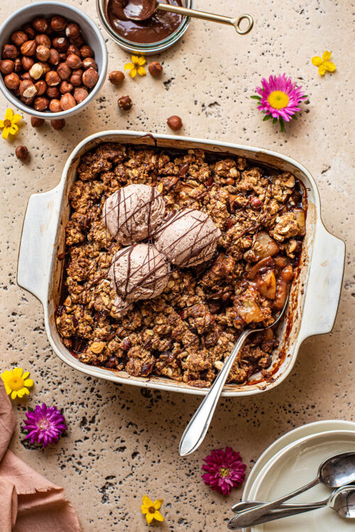 Chocolate pear crisp with three scoops of ice cream.
