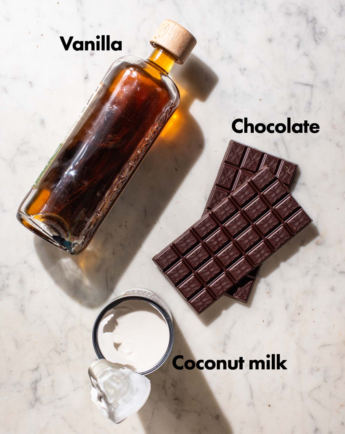 Vegan chocolate ganache ingredients with labels.