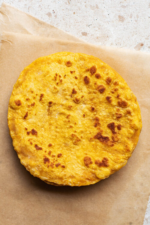 Top down view of a stack of flatbreads.