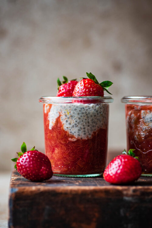 Jars of chia pudding with rhubarb compote.