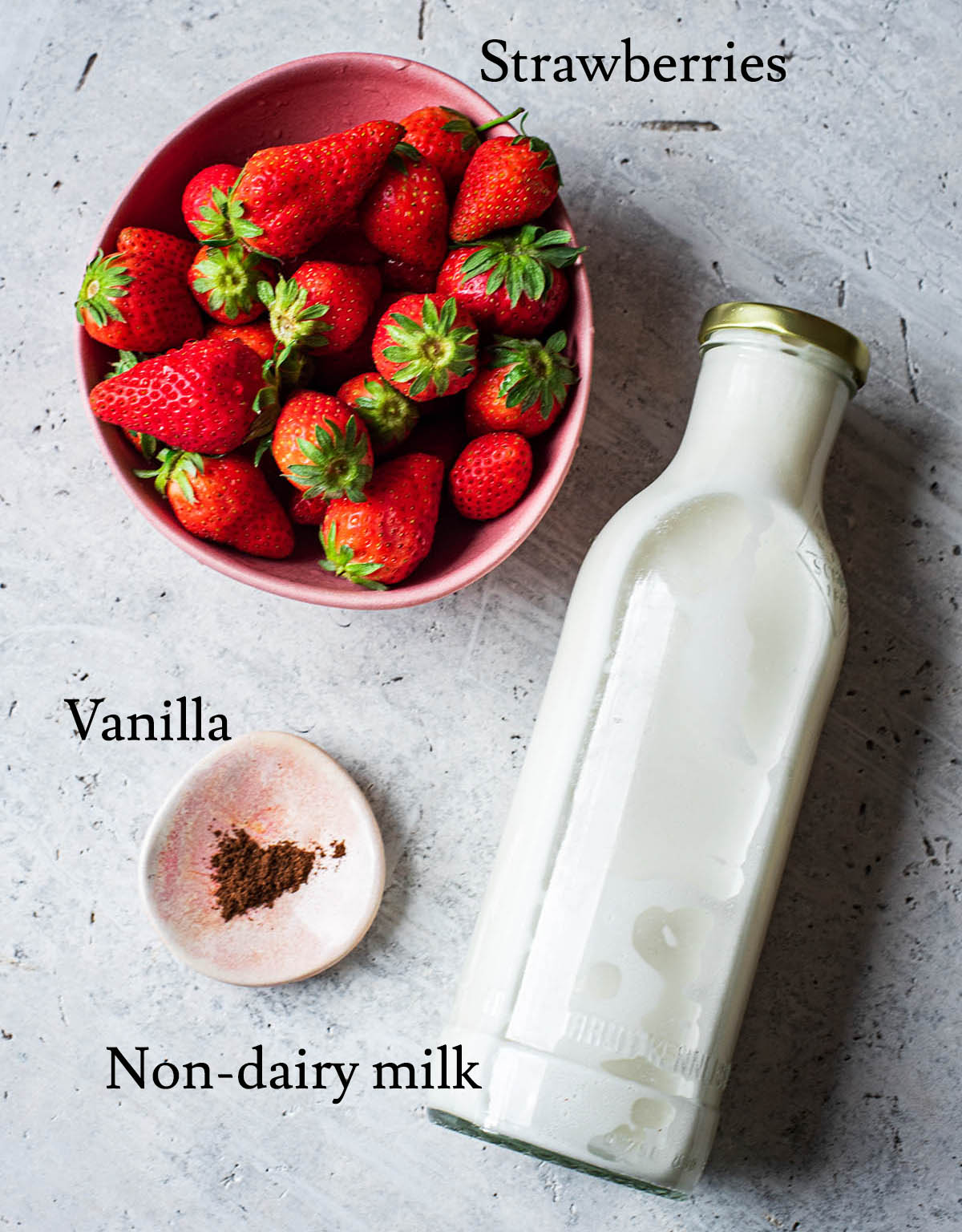 Strawberry milk ingredients with labels.