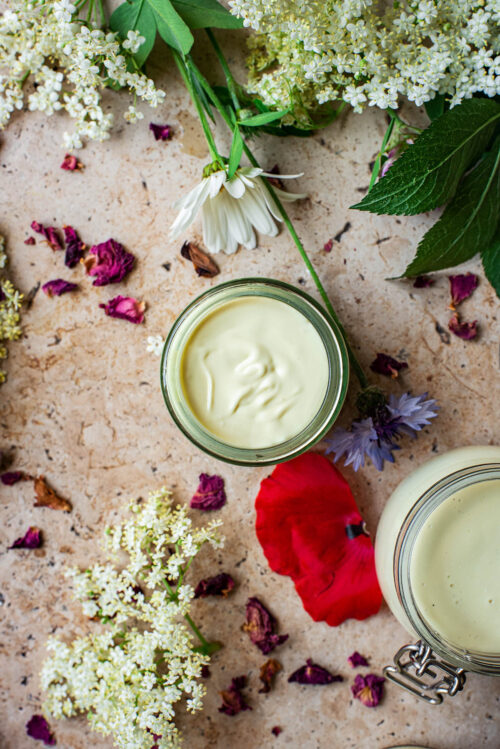 Close up of a small jar of cream.