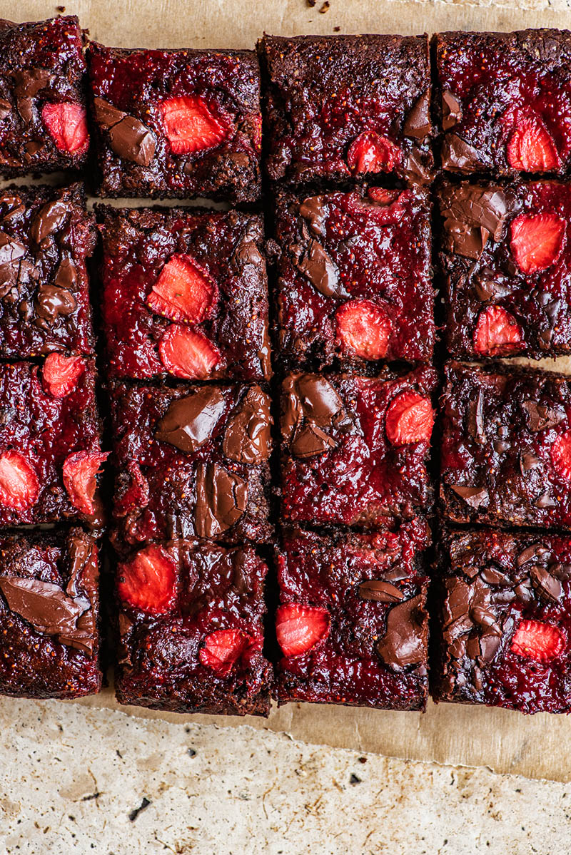 Close up of sliced strawberry brownies, top down view.
