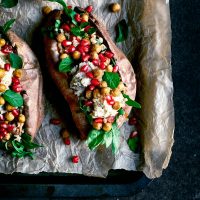 Chickpea, bulgur, and greens stuffed into roasted sweet potato.
