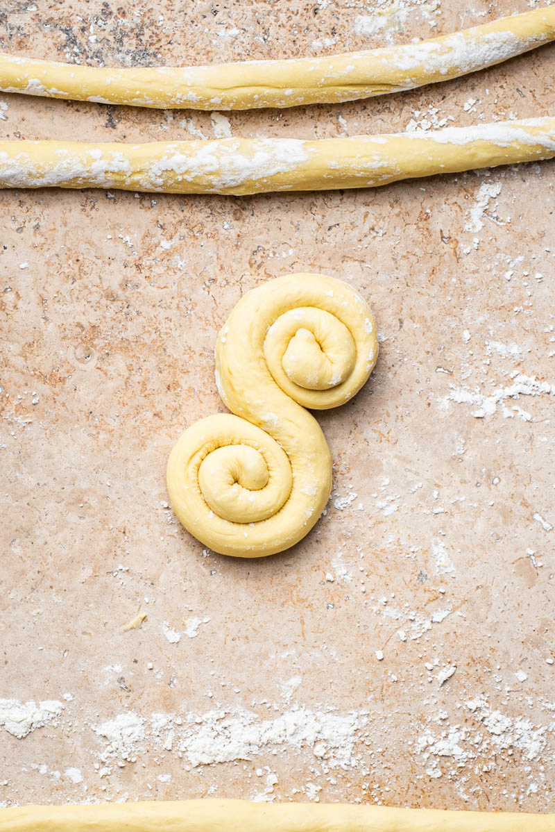 Dough formed into a swirling s-shape.