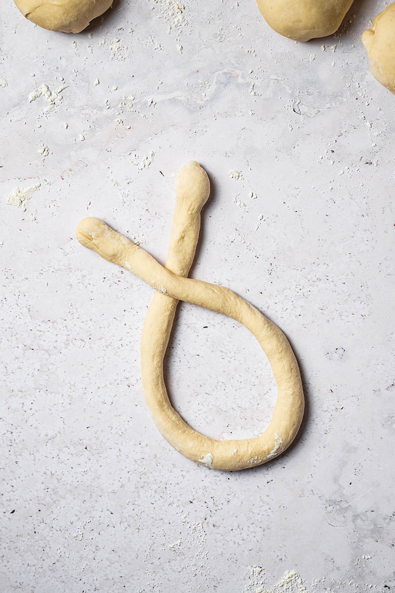 The strand of dough crossed over itself once.