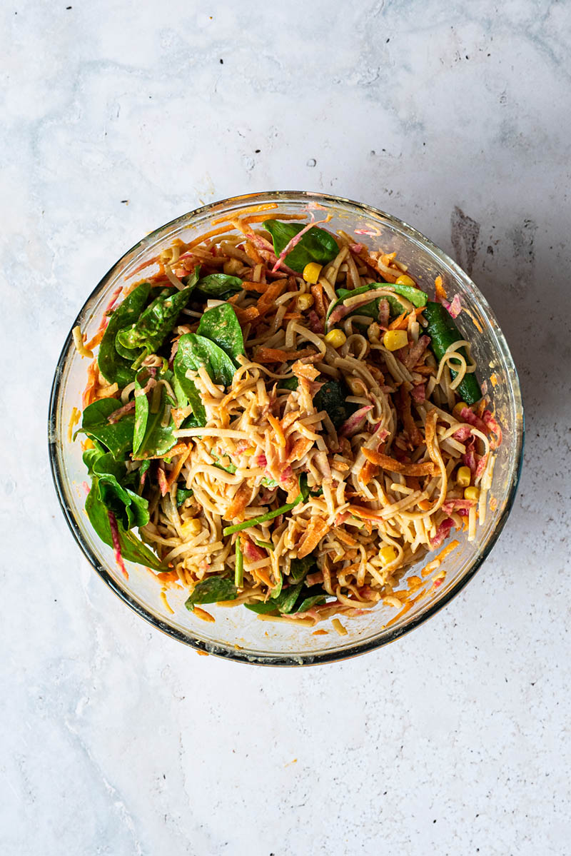 Mixed rice noodle salad in a bowl.