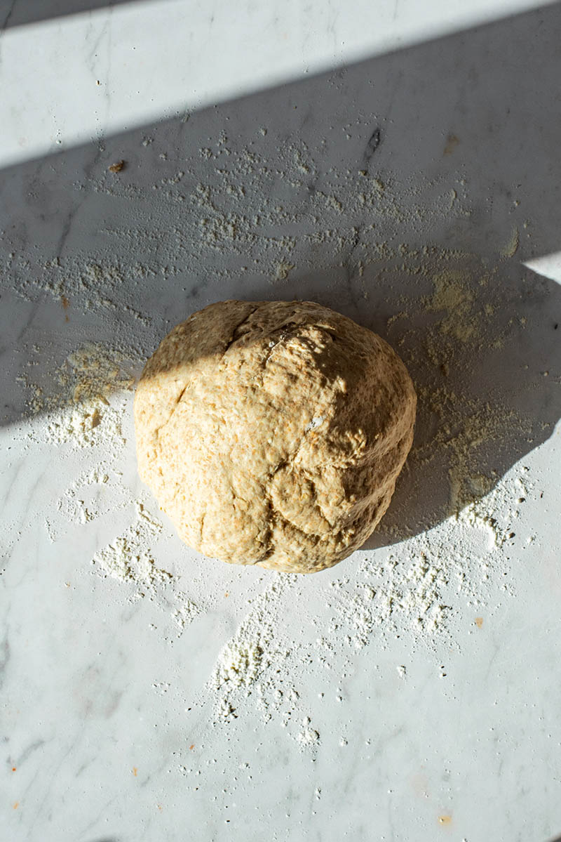 Kneaded dough, in a smooth ball.