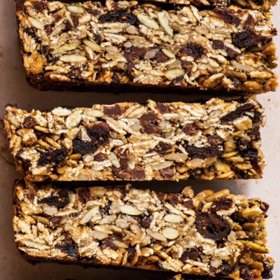 Close up of granola bars on their sides to show interior texture.
