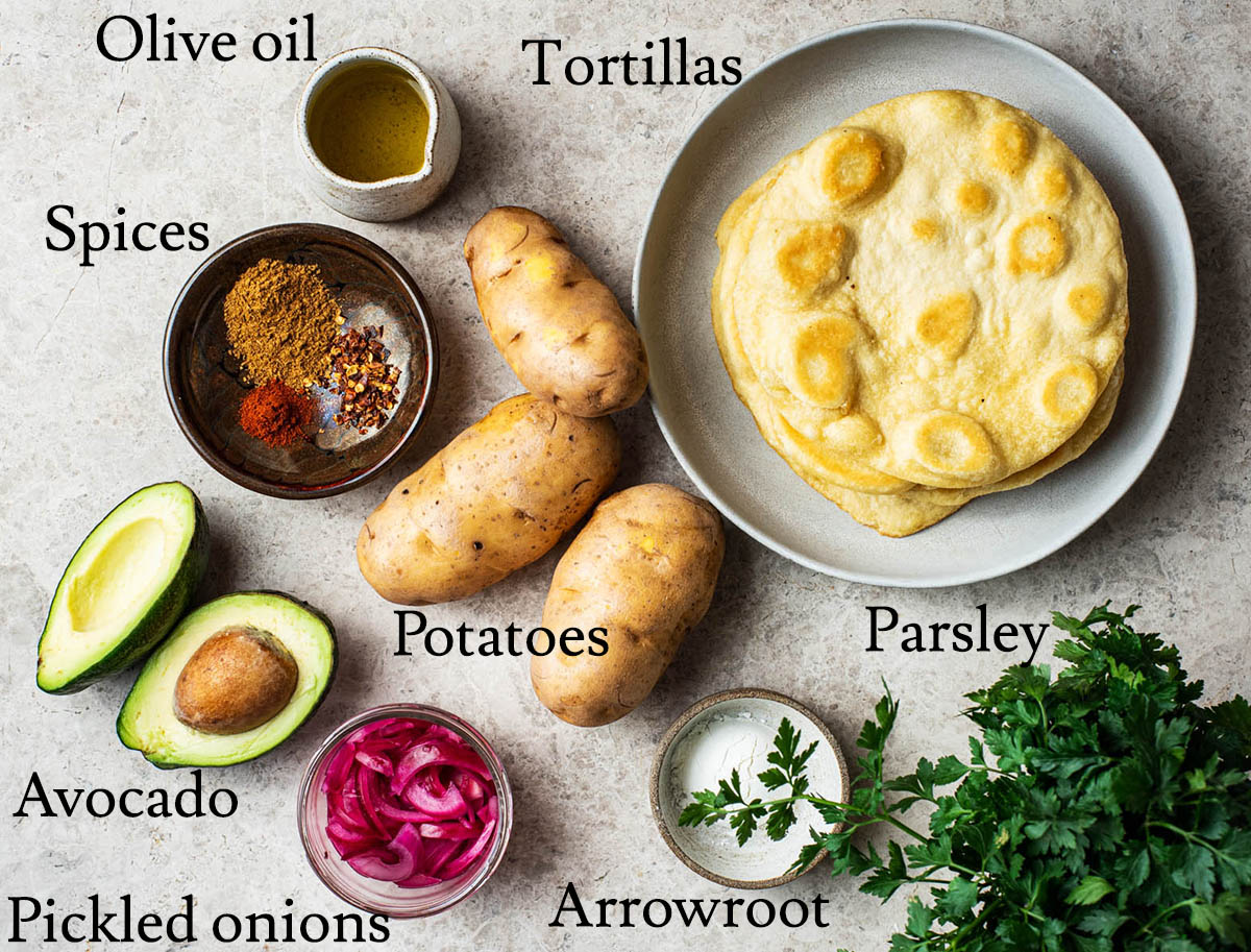 Potato taco ingredients with labels.