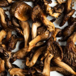 Crispy baked oyster mushrooms on a baking tray.