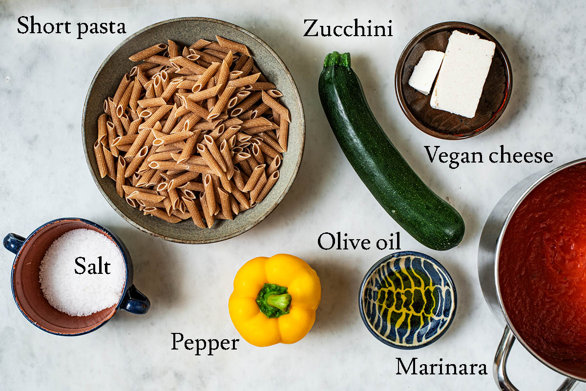 Vegan pasta bake ingredients with labels.