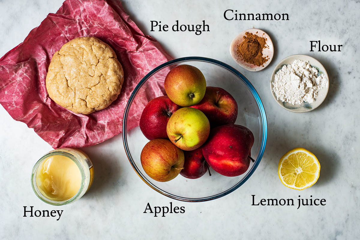 Honey apple pie ingredients with labels.