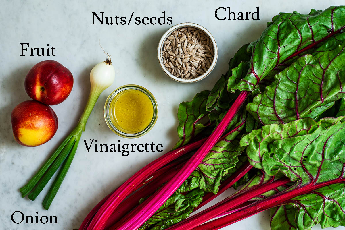 Swiss chard salad ingredients with labels.