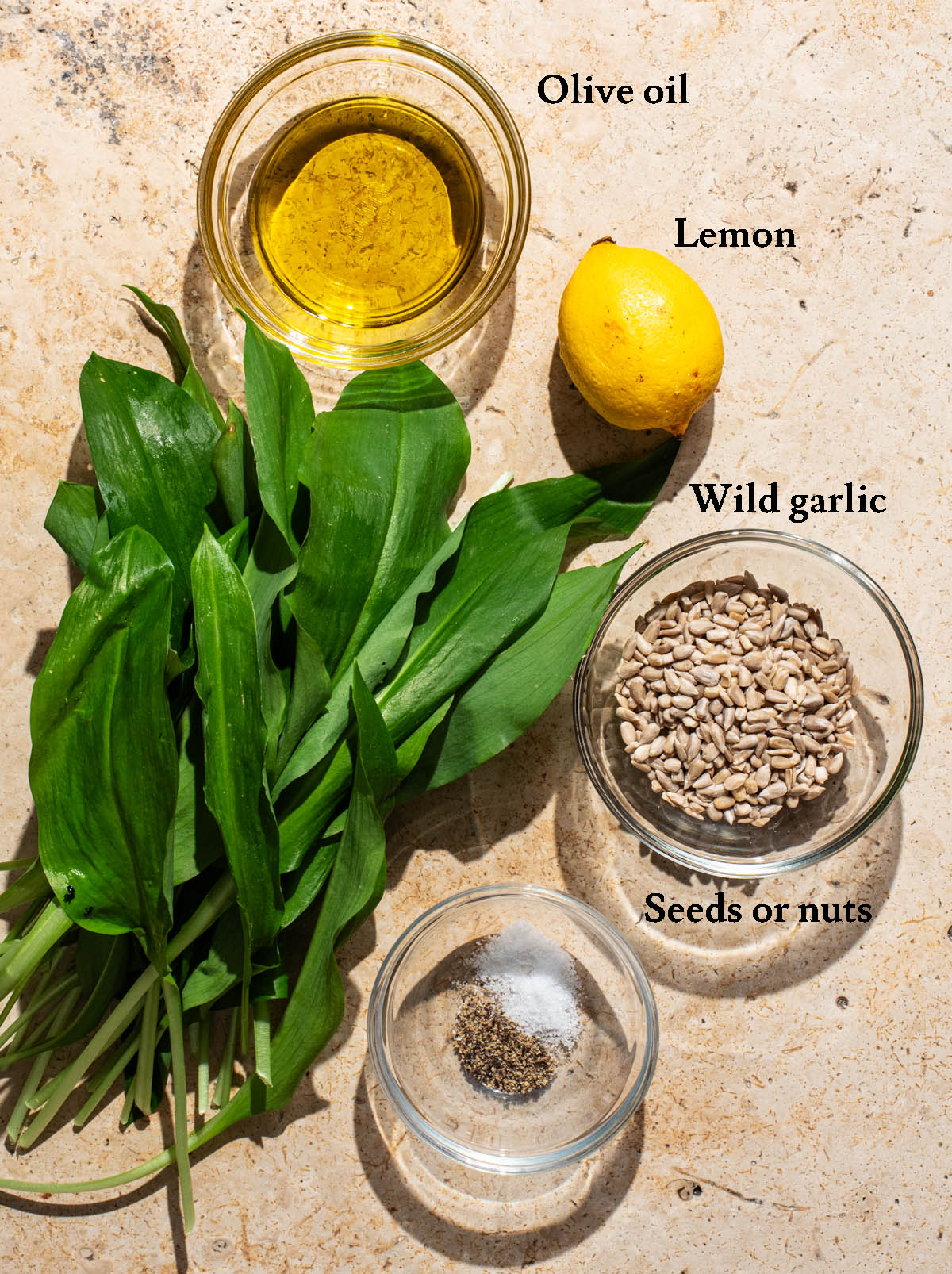 Wild garlic pesto ingredients with labels.