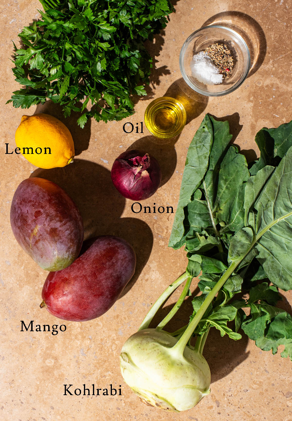 Mango kohlrabi salad ingredients with labels.
