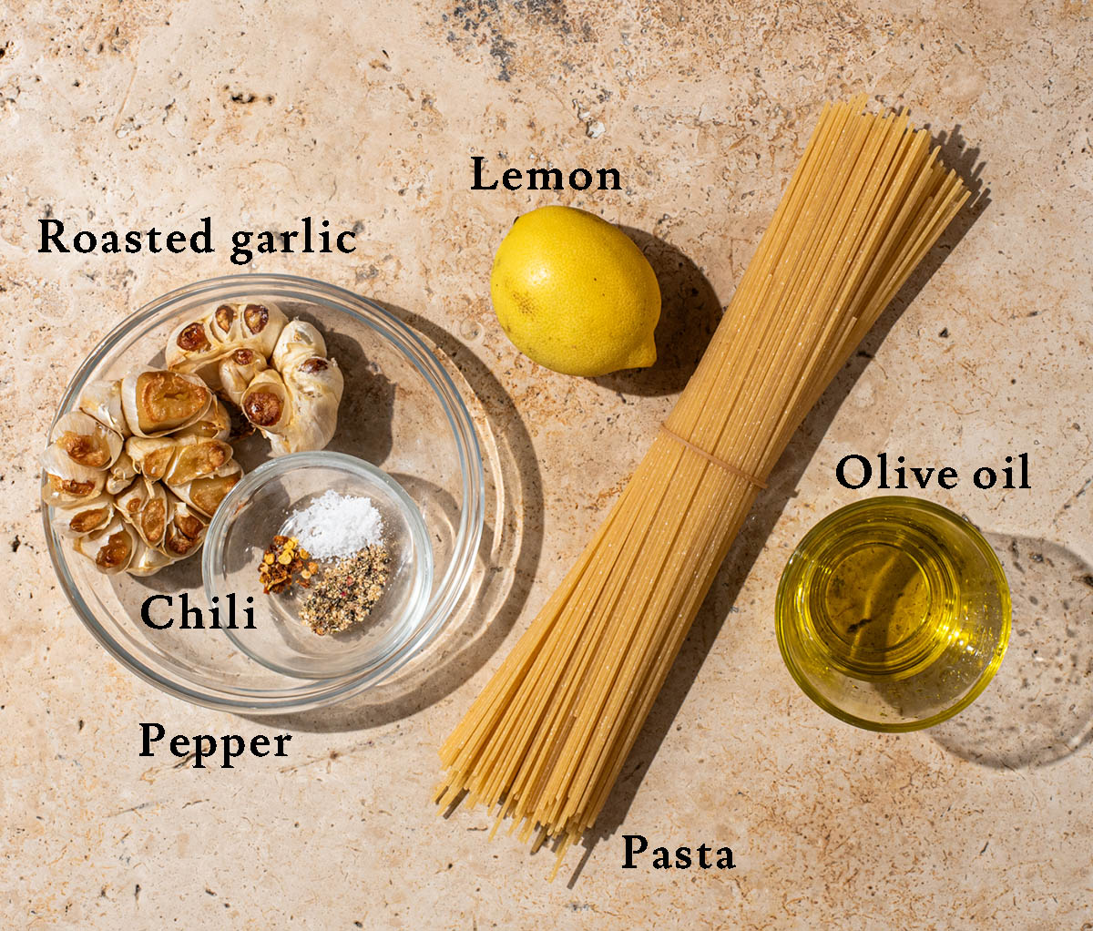 Roasted garlic pasta ingredients with labels.