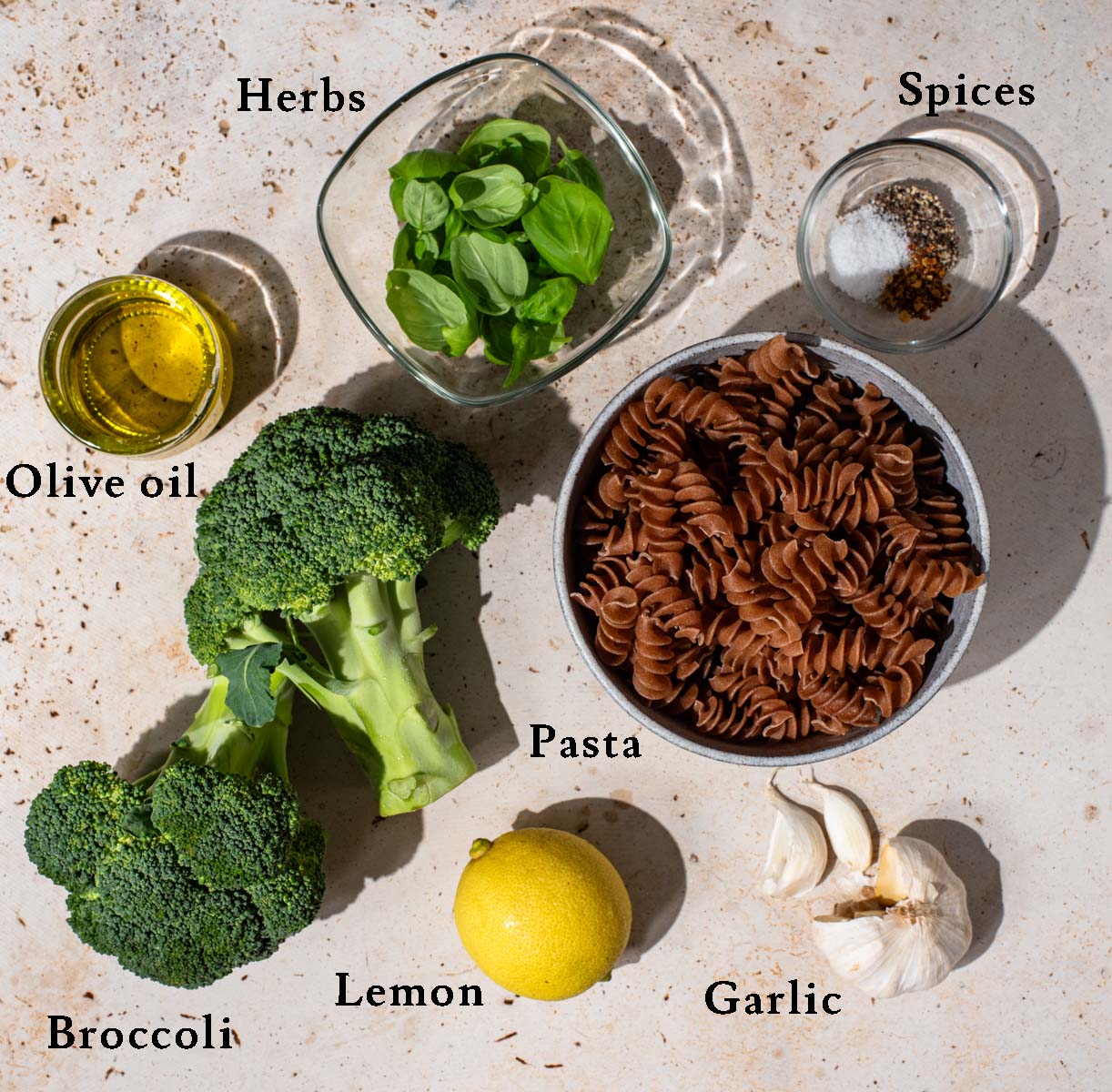 Broccoli pasta ingredients with labels.