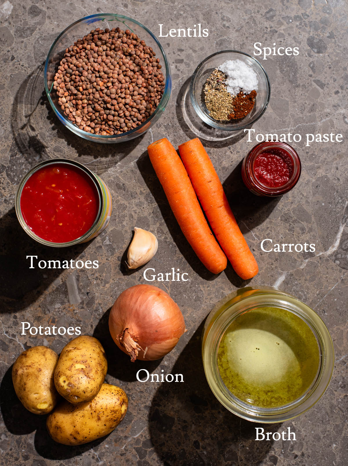 Tomato lentil soup ingredients with labels.