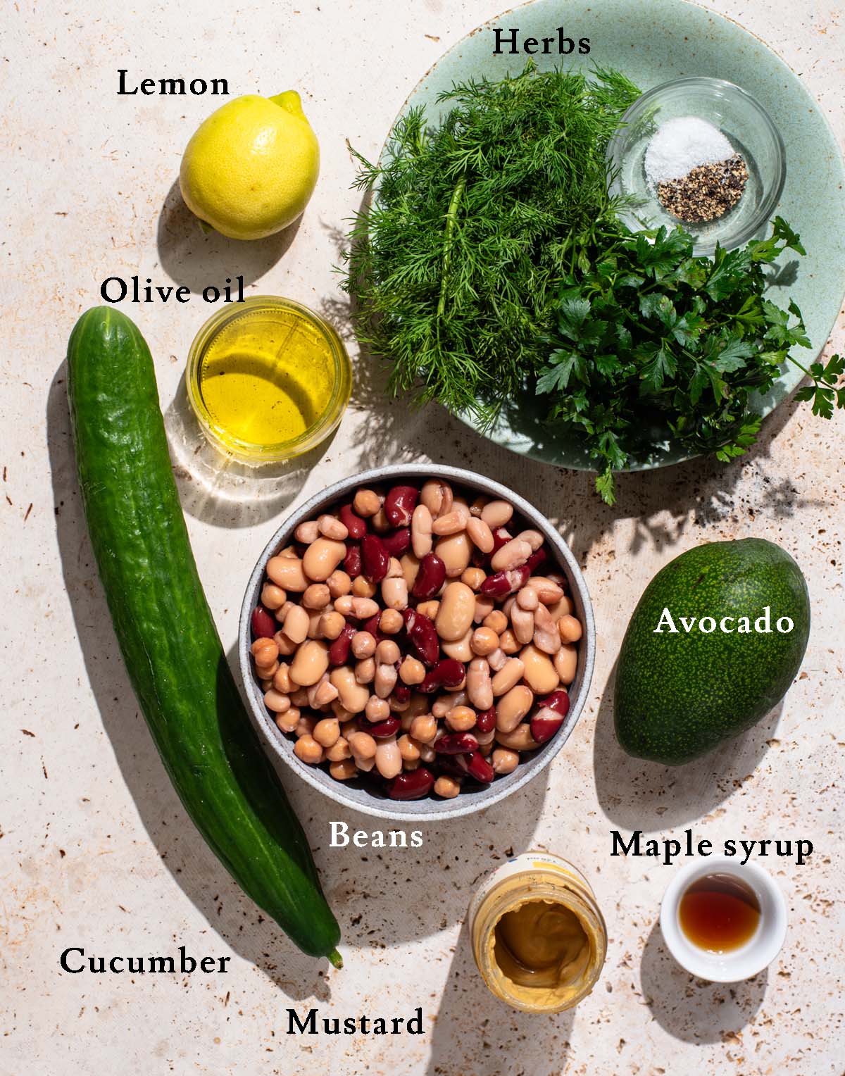 Dense bean salad ingredients with labels.