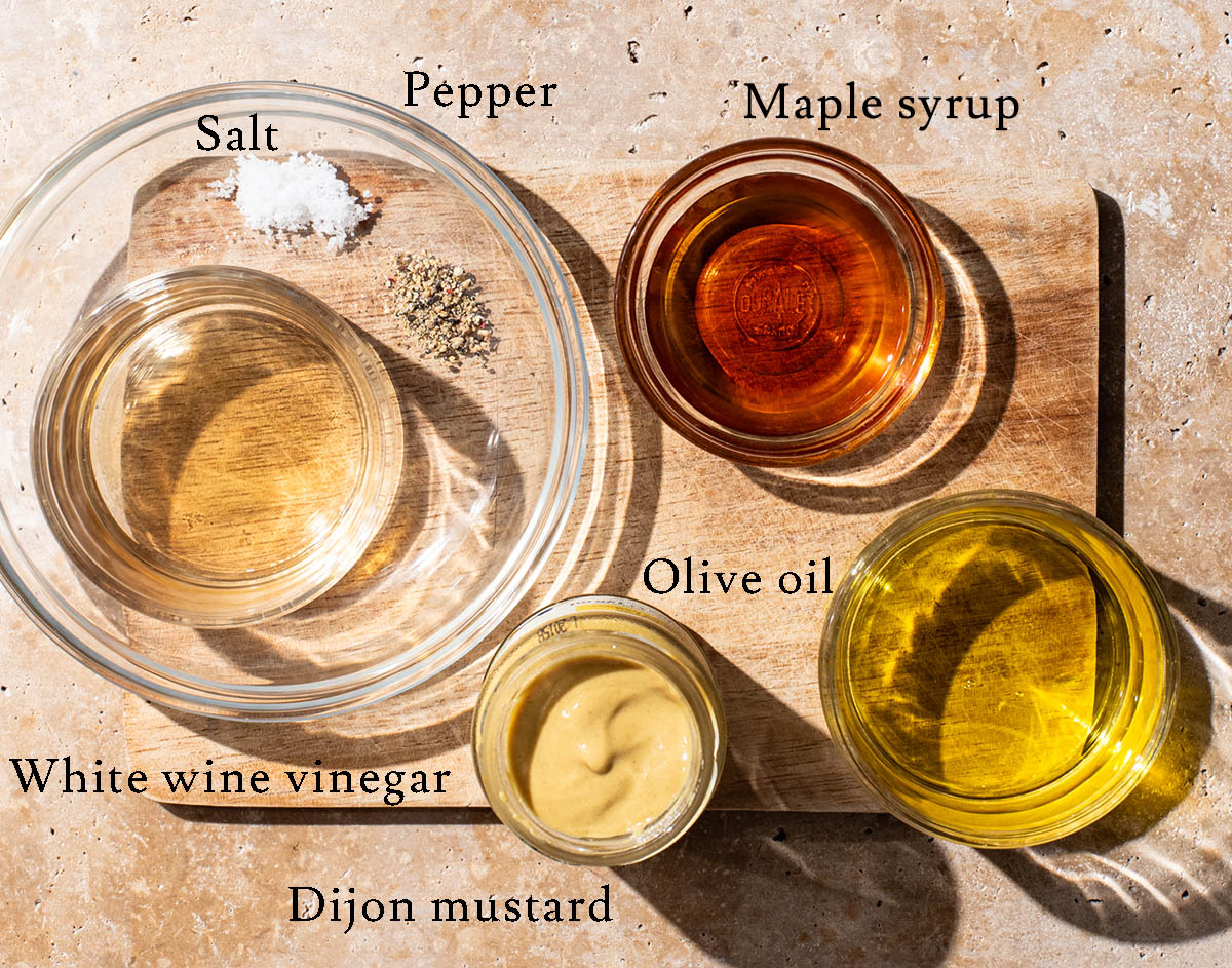 Maple dijon dressing ingredients with labels.