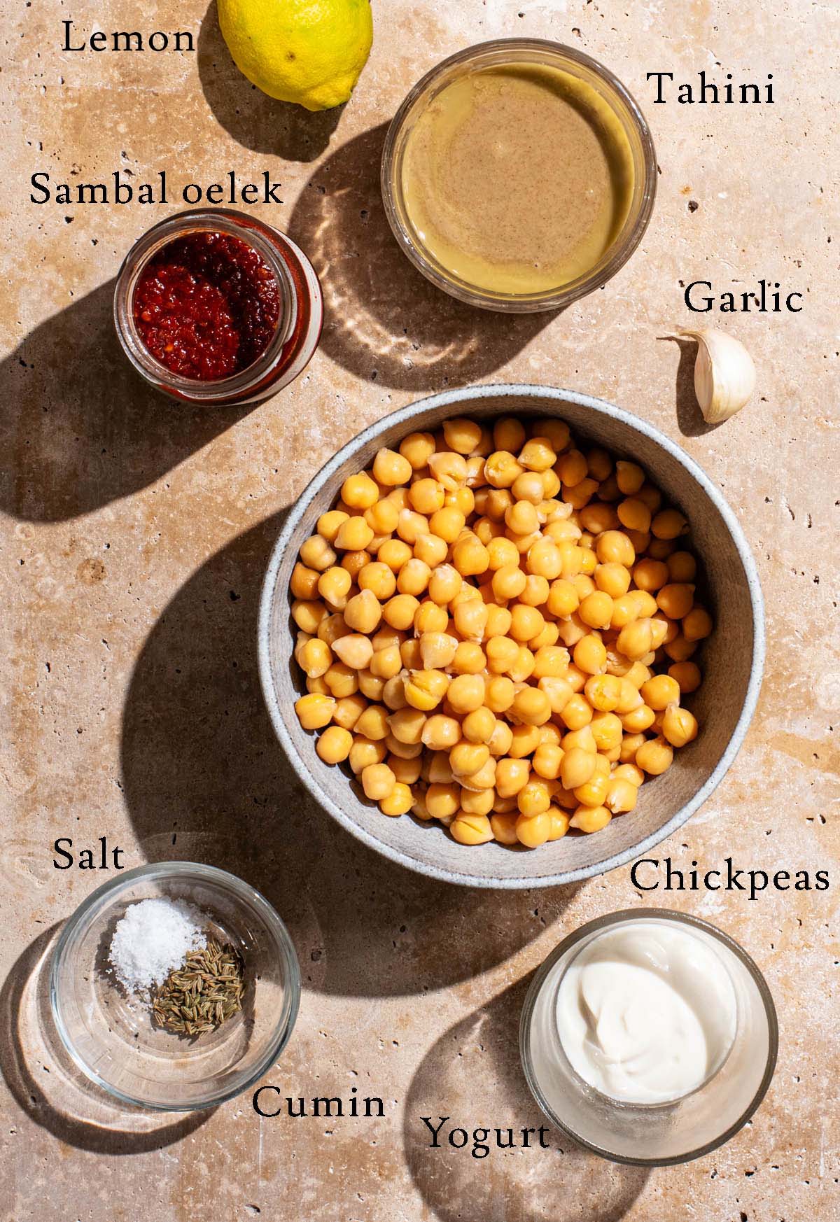 Spicy hummus ingredients with labels.