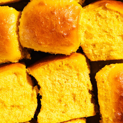 Close up of several pumpkin buns.