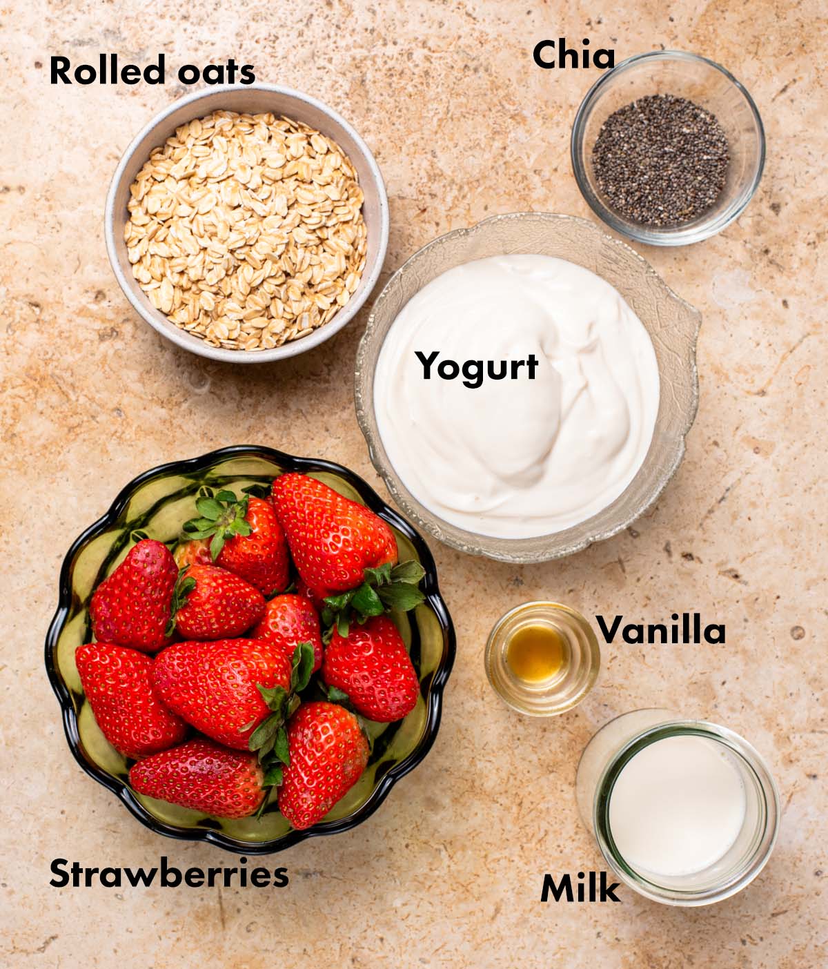 Strawberry overnight oats ingredients with labels.