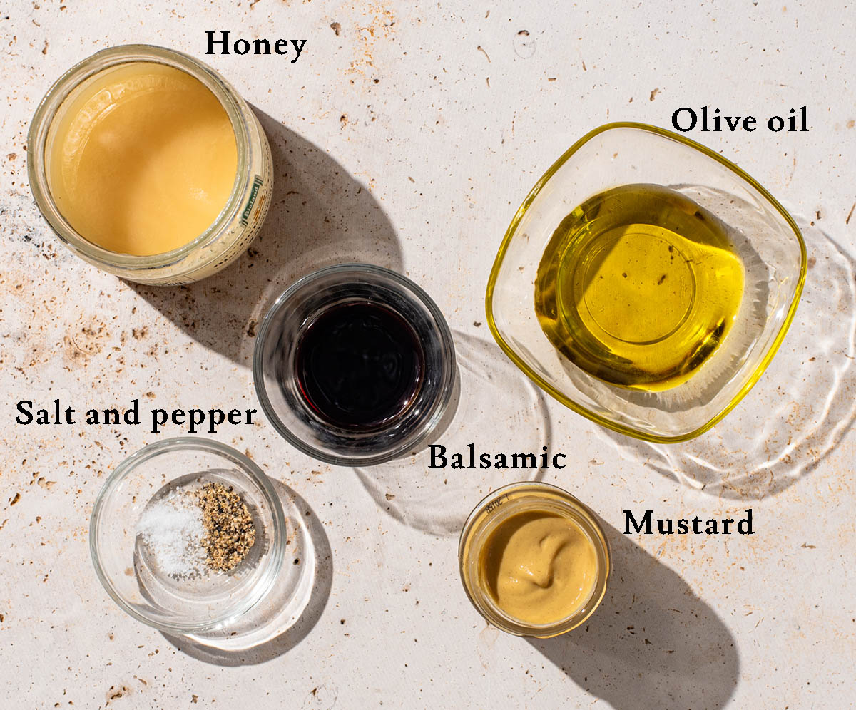 Balsamic vinaigrette ingredients with labels.