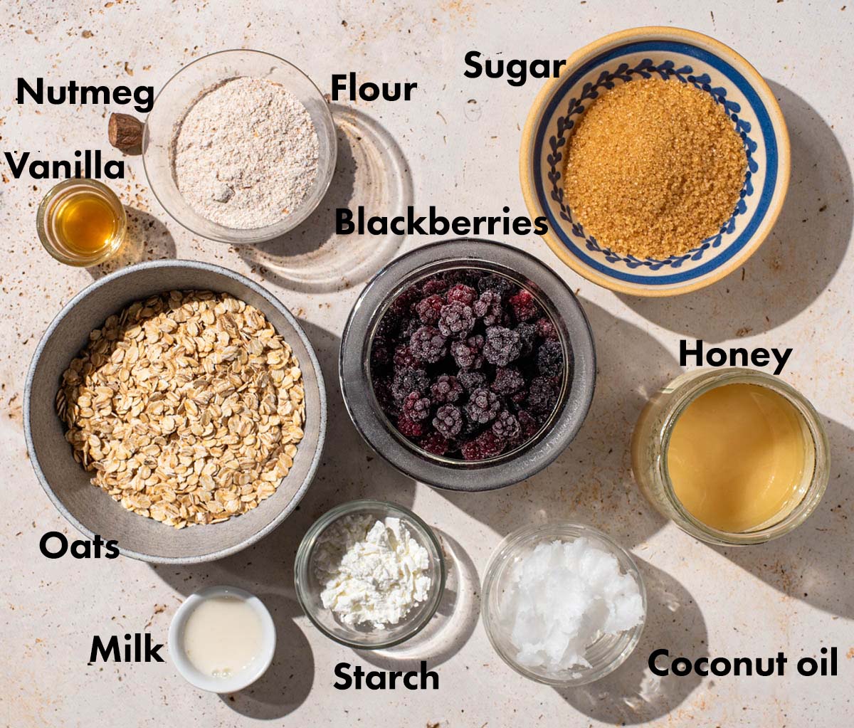 Blackberry crisp ingredients with labels.