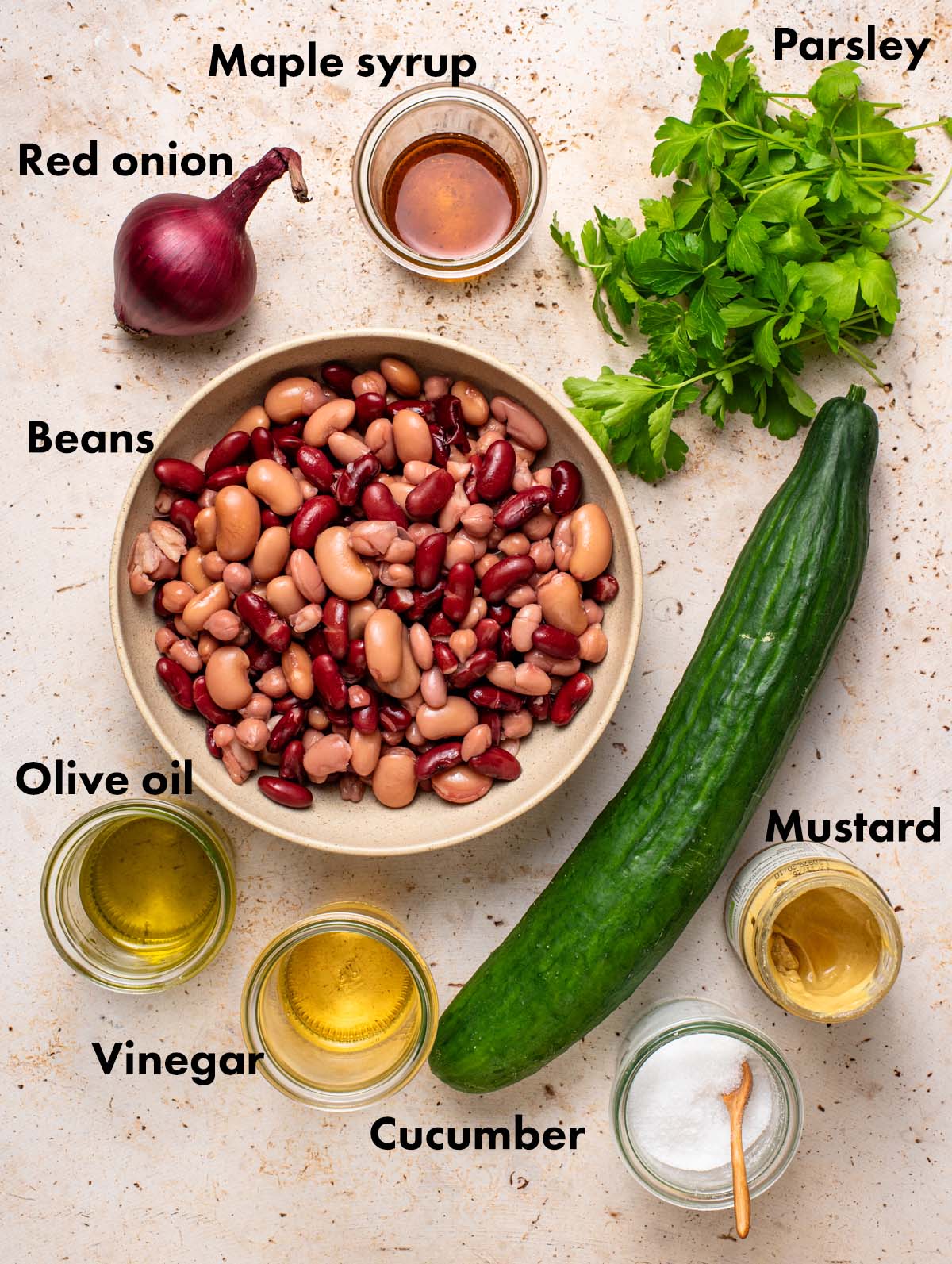 Bean salad ingredients with labels.